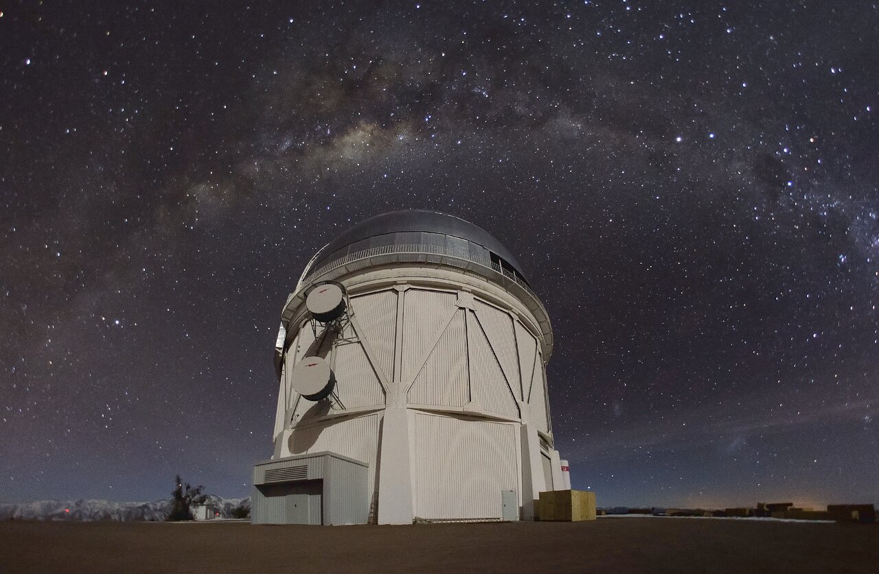 The Víctor M. Blanco 4-meter Telescope dome appears under the Milky Way at Cerro Tololo Inter-American Observatory.