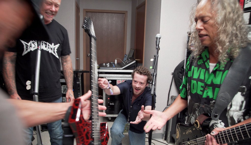 Joseph Quinn being gifted a custom guitar from Metallica