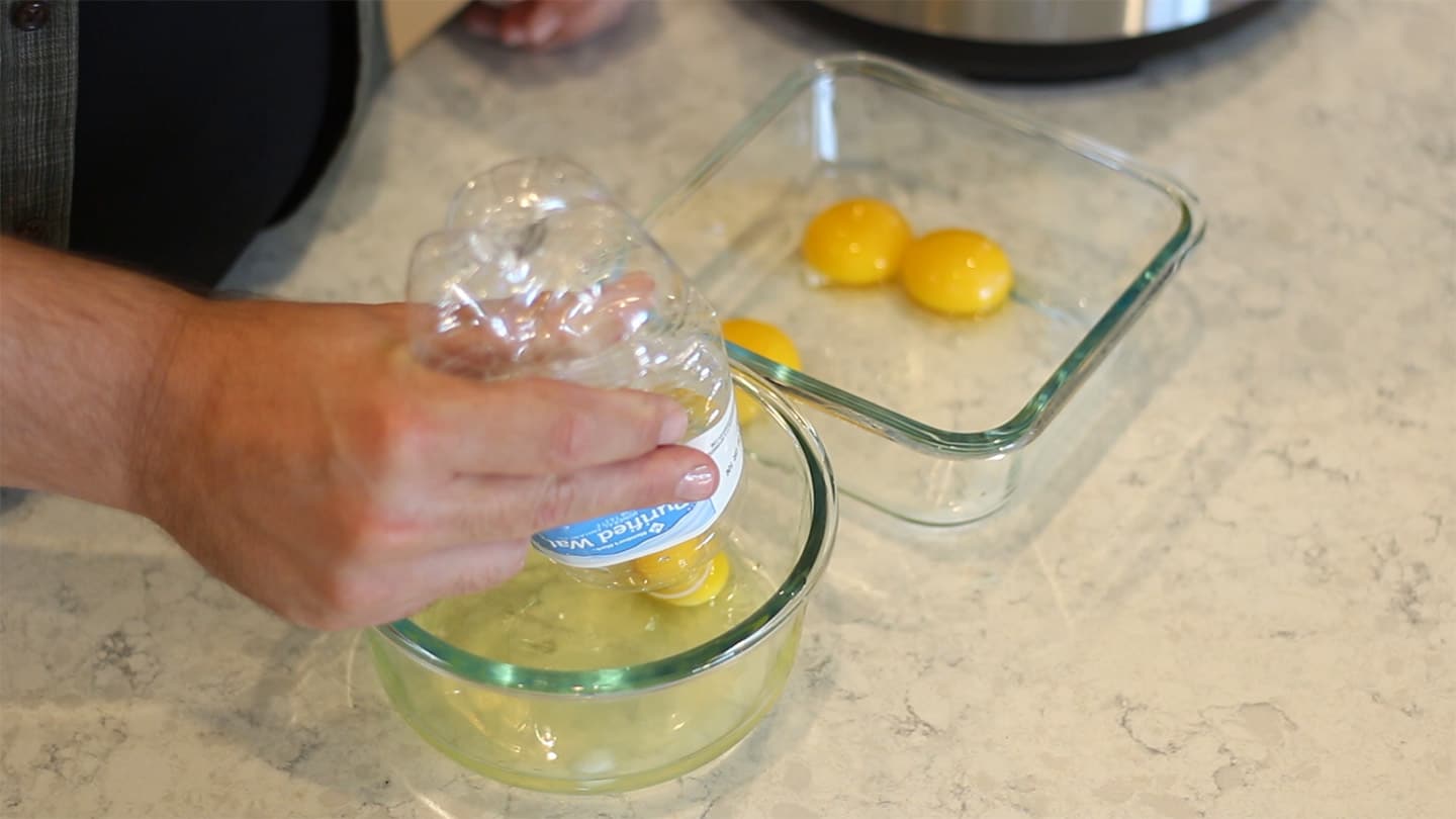 separating egg yolk using a plastic bottle